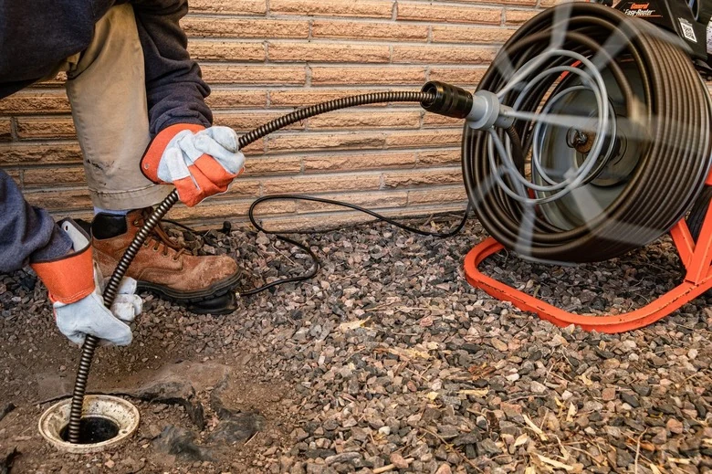 Hydro-jetting and mechanical drain auger cleaning